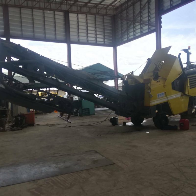 รถกัดถนน